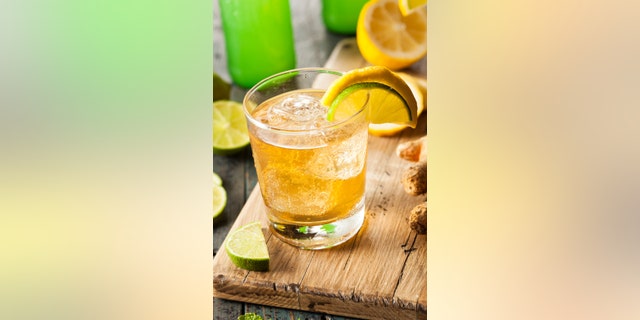 Organic Ginger Ale Soda in a Glass with Lemon and Lime