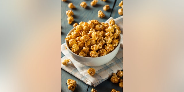 Homemade Golden Caramel Popcorn in a Bowl
