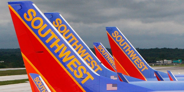 Southwest planes are parked at their gates at Baltimore Washington International Airport in Baltimore.