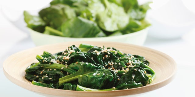 Blanched spinach leaves on plate