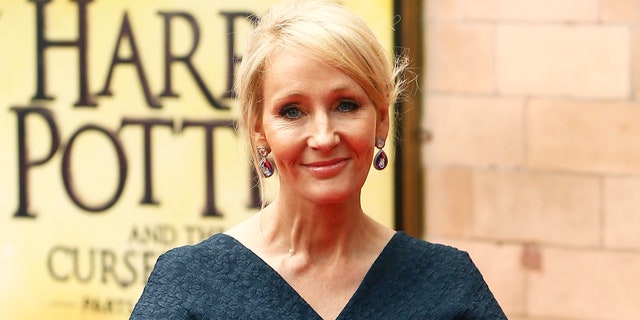 Author J.K. Rowling poses for photographers at a gala performance of the play "Harry Potter and the Cursed Child parts One and Two," in London.