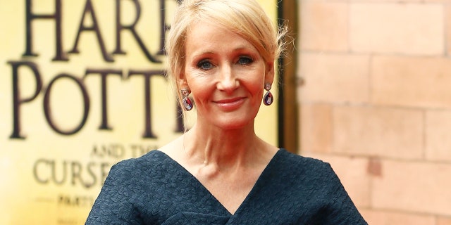 Author J.K. Rowling poses for photographers at a gala performance of the play "Harry Potter and the Cursed Child parts One and Two," in London.