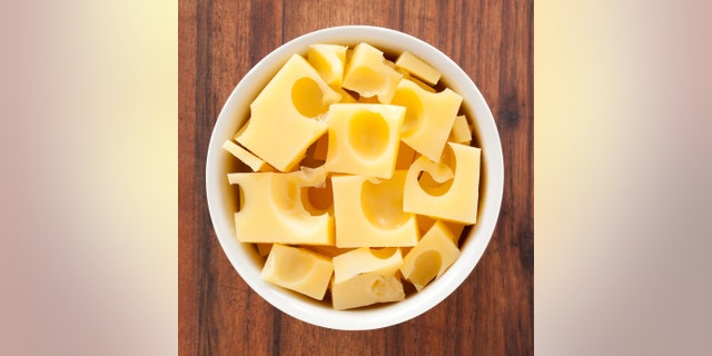 Top view of white bowl full of gruyere cheese cubesRelated lightboxes: