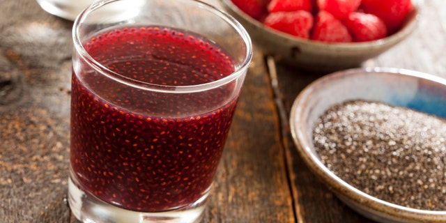 Organic Raspberry and Chia Seed Beverage against a background