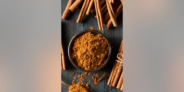 Organic Raw Brown Cinnamon on a Background