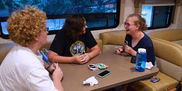 Yes, teens really can have a good time in the wild. Enjoying family time in the RV camping at Bryce Canyon National Park.