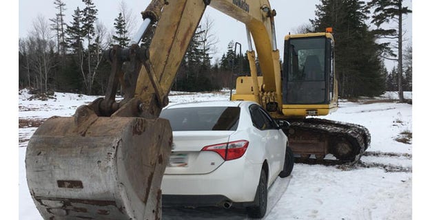 Cops say this excavator helped apprehend a drunk driver Thursday afternoon. (Queens District RCMP)
