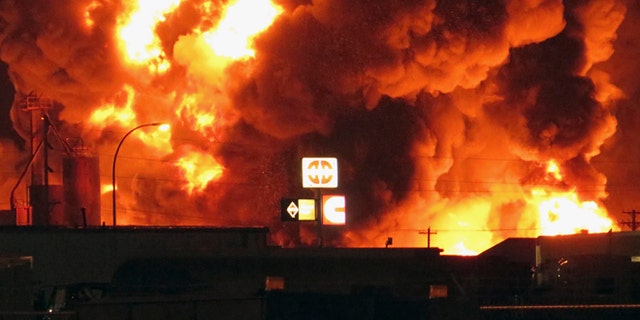 July 22: A fire burns at Red River Supply in an industrial part of Williston, N.D. The site is near three oil companies and a rail line, just east of Williston's downtown.