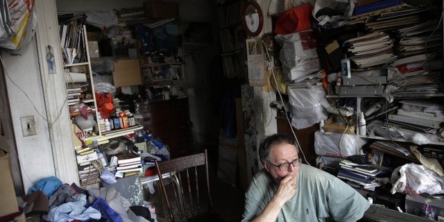 In this Wednesday, March 23, 2016 photo, Adam Chrin talks to a reporter in his apartment in New York.