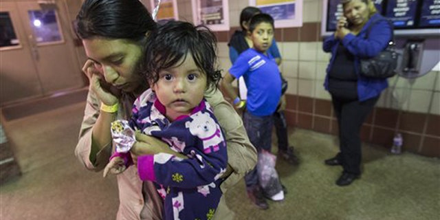 f0d9687c-Migrants Released