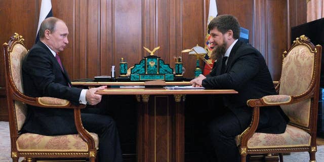 Russian President Vladimir Putin, left, meets with Chechen regional leader Ramzan Kadyrov in the Kremlin in Moscow. The leader of Chechnya says gay men do not exist in his republic and dismisses reports that 100 gay men have been rounded up, tortured and sometimes killed.