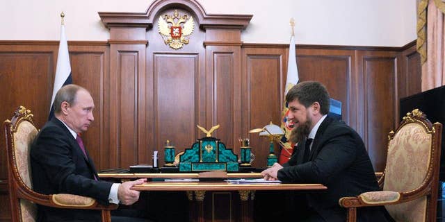 Russian President Vladimir Putin, left, meets with Chechen regional leader Ramzan Kadyrov in the Kremlin in Moscow. The leader of Chechnya says gay men do not exist in his republic and dismisses reports that 100 gay men have been rounded up, tortured and sometimes killed.