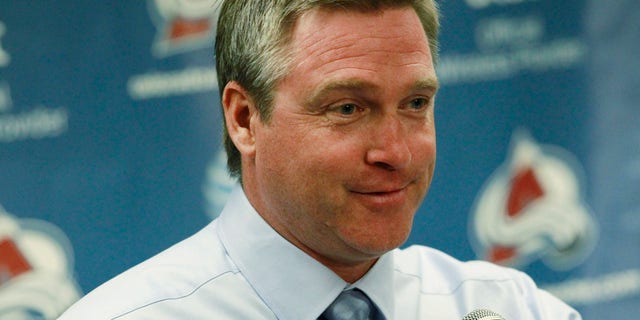 FILe - In this Oct. 2, 2013 file photo, Colorado Avalanche head coach Patrick Roy smiles as he takes questions after the Avalanche's 6-1 victory over the Anaheim Ducks in a hockey game in Denver. Behind the goalie-turned-coach, the team is 6-0 and can match the best start in franchise history with a win over the rival Red Wings on Thursday night, Oct. 17, 2013. (AP Photo/David Zalubowski, File)