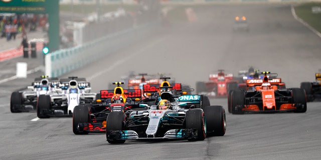 Lewis Hamilton leads the field at the Malaysian Formula One Grand Prix