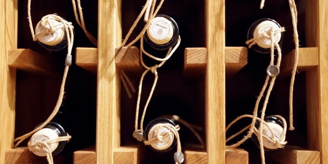April 27, 2013: Bbottles of local made sweet wine Prosek are seen on a shelf in a wine cellar in Jelsa, southern Croatia.