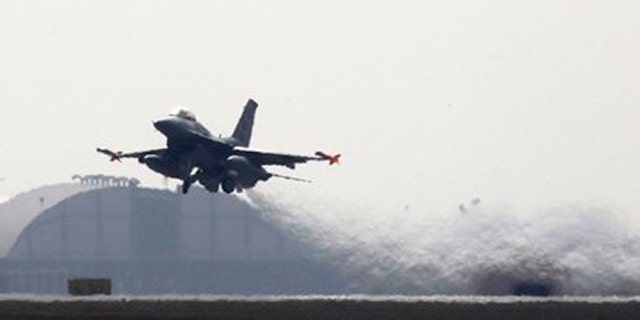 A 31st Fighter Wing United States Air Force F-16 jet fighter takes off at the Aviano NATO airbase in Aviano, Italy, March 25.