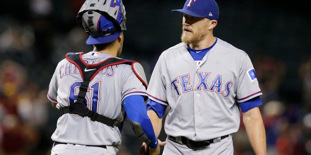 Texas Rangers pitcher Jake Diekman was traded to the Arizona Diamondbacks on Tuesday, and all he had to do was take a golf cart to the other side of Chase Field.