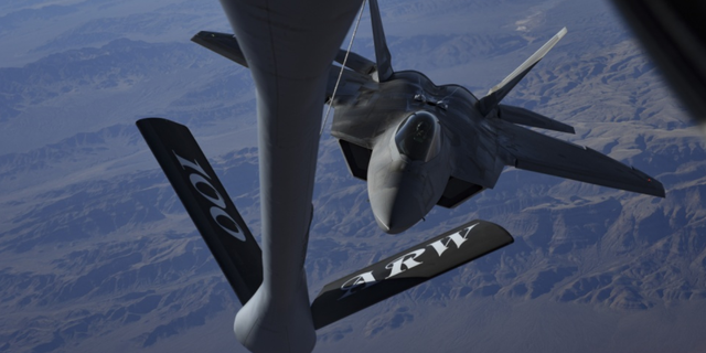 An F-22 Raptor fighter jet assigned to the 27th Fighter Squadron at Joint Base Langley-Eustis, Virginia, approaches an in-flight refueling boom during Red Flag 18-1 over the Nevada Test and Training Range Feb. 7, 2018. Red Flag provides pilots with training using real-time war scenarios