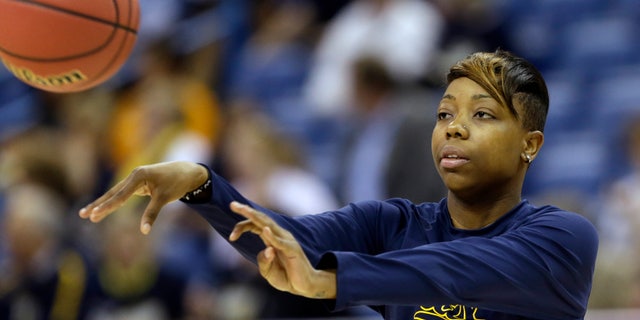California guard Tierra Rogers passes a ball during practice at the Women's Final Four of the NCAA college basketball tournament, Saturday, April 6, 2013, in New Orleans. California plays Louisville in a national semifinal on Sunday. (AP Photo/Gerald Herbert)