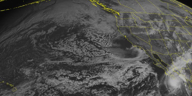 This NOAA satellite image taken Sunday, November 03, 2013 at 02:00 PM EDT shows Tropical Storm Sonia approaching the southern Baja Peninsula with maximum winds of 45mph. Low pressure system over the Northwest with areas of snow showers. Rain showers are seen over New Mexico. (AP PHOTO/WEATHER UNDERGROUND)