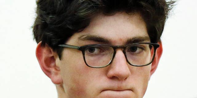 FILE - In this Oct. 29, 2015 file photo, Owen Labrie listens to prosecutors before being sentenced in Merrimack County Superior Court in Concord, N.H. Labrie was convicted in August of sexually assaulting a younger student and was sentenced to jail. In a motion filed Wednesday, April 6, 2016, Labrie seeks a new trial, saying his former lawyers were ineffective. (AP Photo/Jim Cole, Pool, File)