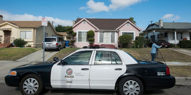LOS ANGELES, CA - MAY 20: A police car sits parked in fromt of Michael Jace's home on May 20, 2014 in Los Angeles, California. The actor has been arrested for the murder of his wife . (Photo by Valerie Macon/Getty Images)