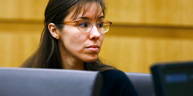 Defendant Jodi Arias looks to her family during closing arguments during her trial on Friday, May 3, 2013 at Maricopa County Superior Court in Phoenix. Arias is charged with first-degree murder in the stabbing and shooting death of Travis Alexander, 30, in his suburban Phoenix home in June 2008. (AP Photo/The Arizona Republic, Rob Schumacher, Pool)