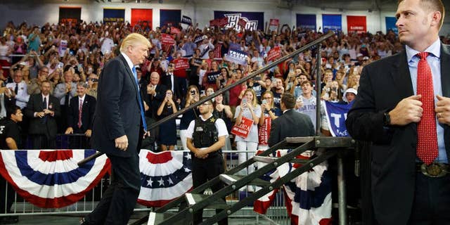 Republican presidential candidate Donald Trump arrives to speak at a campaign rally at High Point University, Tuesday, Sept. 20, 2016, in High Point, N.C. (AP Photo/ Evan Vucci)
