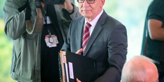 Aug. 17, 2016: German Interior Minister Thomas de Maiziere arrives for a cabinet meeting at the chancellery in Berlin.