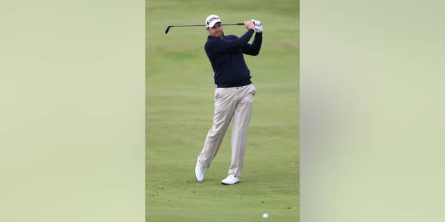 Matthew Southgate of England plays his shot on the 6th fairway during a practice round for the British Open Golf Championships at the Royal Troon Golf Club in Troon, Scotland, Tuesday, July 12, 2016. (AP Photo/Peter Morrison)