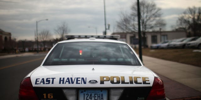 EAST HAVEN, CT - FEBRUARY 01: An East Haven Police car is viewed on February 1, 2012 in East Haven, Connecticut. Following an investigation by the FBI, four East Haven police officers were arrested last week and accused of abusing Latinos in the working class community of 28,000 people which was nearly predominately white a generation ago. A recent civil rights investigation which was released last month revealed a pattern of discriminatory policing East Haven and the town has been warned by the U.S. Justice Department to make reforms. The arrested officers have been accused of subjecting Hispanics to beatings and false arrests among other things. Currently East Haven's Latino population is around 10 percent. (Photo by Spencer Platt/Getty Images)