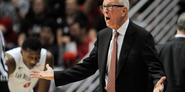 San Diego State's head coach Steve Fisher argues a call during the first half of an NCAA college basketball game against Colorado States on Saturday, Feb. 1, 2014, in San Diego. (AP Photo/Denis Poroy)