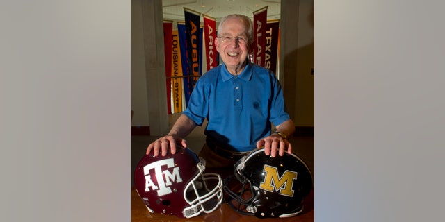 FILE - In this July 12, 2012, file photo, Southeastern Conference Commissioner Mike Slive poses for a photo at the SEC headquarters in Birmingham, Ala. Slive has checked off two huge items from his to-do list: completing the admission of Missouri and Texas A&M and cutting a deal for an SEC Network. (AP Photo/Dave Martin, File)
