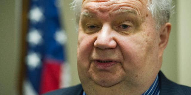 FILE - In this Sept. 6, 2013, file photo, Sergey Kislyak, Russia's ambassador to the U.S. speaks with reporters following his address on the Syrian situation at the Center for the National Interest in Washington. A member of Donald Trump's transition team asked national security officials in the Obama White House for the classified CIA profile on Kislyak. The unusual request appears to signal that Trump's own team had concerns about whether his pick for national security adviser, Mike Flynn, fully understood that he was dealing with a man rumored to have ties to Russian intelligence agencies. (AP Photo/Cliff Owen, File)