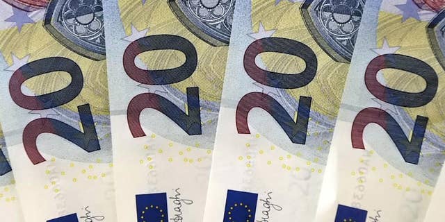 FILE - In this Tuesday, Oct. 27, 2015, file photo, new 20 euro banknotes are arranged for display during a news conference at the branch office of the German Federal Bank in Erfurt, Germany. No one is lining up to join the 19-country currency, and the next memberships, if any, will only be years down the road, certainly not in this decade. It marks a shift from a recent boom in membership, with seven countries joining in the past nine years, and reflects in part a growing wariness of forging closer economic ties. (AP Photo/Jens Meyer, File)