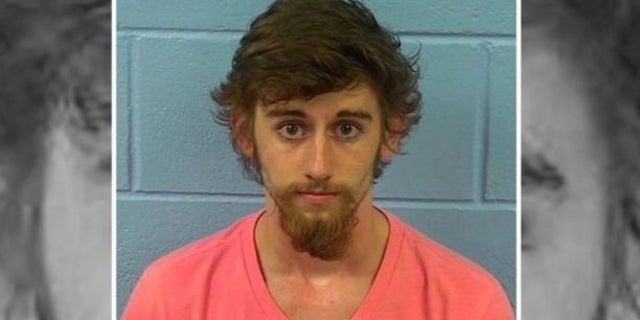 Matthew Qualls was arrested just days after criticizing Etowah County Sheriff Todd Entrekin for keeping the fund surplus.