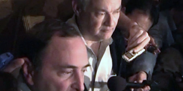 In this image from video, NHL commissioner Gary Bettman, left, talks to the media as Donald Fehr, executive director of the NHL Players' Association, stands next to him, in New York, early Sunday, Jan. 6, 2013. A tentative deal to end the 113-day NHL lockout was reached early Sunday morning following a marathon 16-hour negotiating session. (AP Photo/The Canadian Press, Chris Johnston)