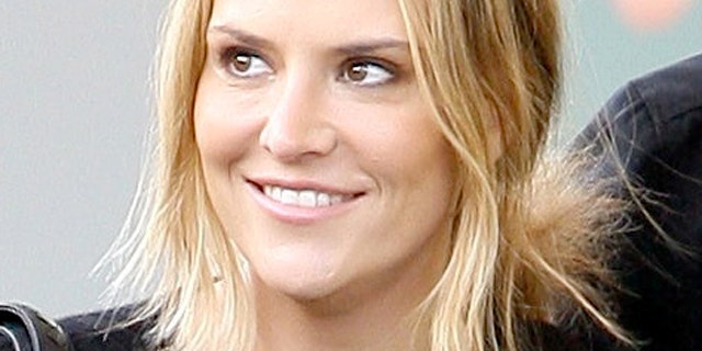 Charlie Sheen and wifeBrooke Mueller at the LA Lakers playoff game against the Denver Nuggets. May 21, 2009. X17online.com exclusive