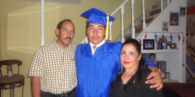 Marcos Muñoz and his parents. Muñoz traveled to Tijuana after his graduation ceremony to celebrate his graduation with the people he loves the most.