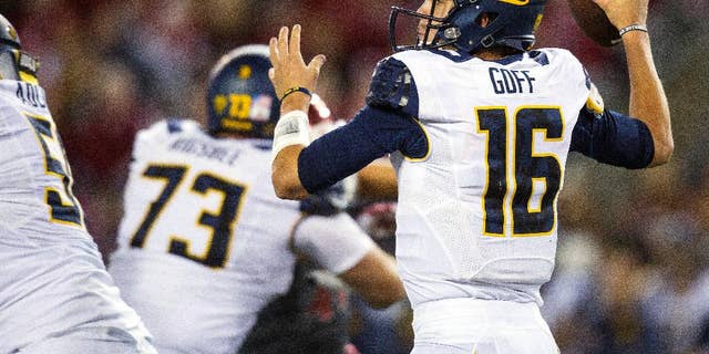 California quarterback Jared Goff (16) passes to Bryce Treggs against Washington State during the first quarter of an NCAA college football game Saturday, Oct. 4, 2014, at Martin Stadium in Pullman, Wash. (AP Photo/Dean Hare)