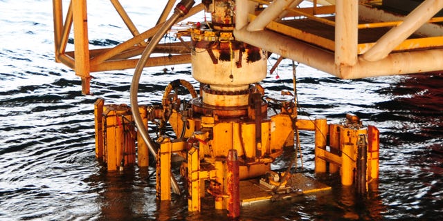 GULF OF MEXICO - SEPTEMBER 4: (EDITORS NOTE: Image has been released by U.S. Military prior to transmission.) In this handout image provided by the U.S. Coast Guard, the damaged blow out preventer along with the Lower Marine Riser Package (LMRP) cap from the Deepwater Horizon oil rig that caused the massive oil spill is extracted and put aboard the vessel Q4000 on September 4, 2010 in the Gulf of Mexico. The 50-foot, 300-ton preventer was removed and replaced on the well head by a newly tested preventer and will be taken for evidence to a NASA facility in Louisiana in the ongoing investigation with the Deepwater Horizon Criminal Investigation Team and FBI Evidence Recovery Team. (Photo by Petty Officer 1st Class Thomas M. Blue/U.S. Coast Guard via Getty Images)