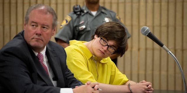 Attorney Edward Gavin, left, sits in superior court with his client Christopher Plaskon during Plakson's sentencing Monday, June 6, 2016 in Milford, Conn. Plaskon was sentenced to 25 years in prison for fatally stabbing classmate Maren Sanchez inside Jonathan Law High School in Milford after she turned down his invitation to the junior prom in 2014. (Melanie Stengel/The Hartford Courant via AP, Pool)