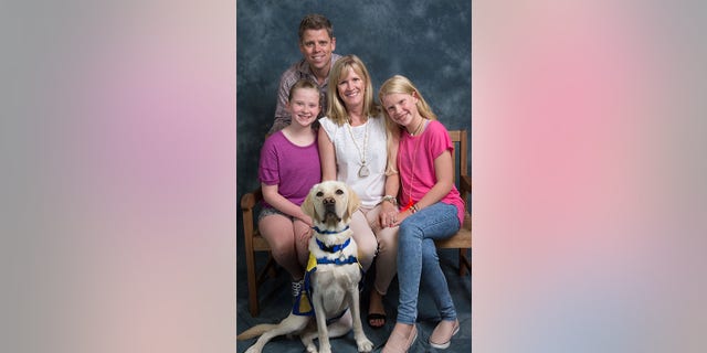 Albie successfully graduated as a service dog in May.