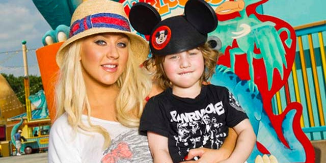April 11, 2011: SInger Christina Aguilera poses with her son Max at Disney's Animal Kingdom theme park at Walt Disney World Resort in Lake Buena Vista, Fla.