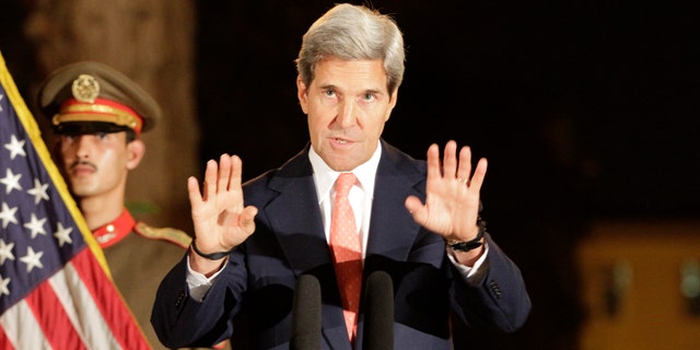 U.S. Secretary of State John Kerry speaks during a joint news conference with Afghanistan's President Hamid Karzai at the presidential palace in Kabul, Afghanistan on Saturday, Oct. 12, 2013. U.S. Secretary of State John Kerry says a partial agreement has been reached with Afghanistan on a security accord but the potentially deal-breaking issue of jurisdiction for American forces remains unresolved. (AP Photo/Ahmad Jamshid)