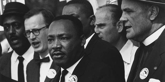 The Civil Rights March on Washington, D.C., with Dr. Martin Luther King Jr. and Mathew Ahmann in a crowd. (NARA - 542015 - Restoration.jpg 28 August 1963)