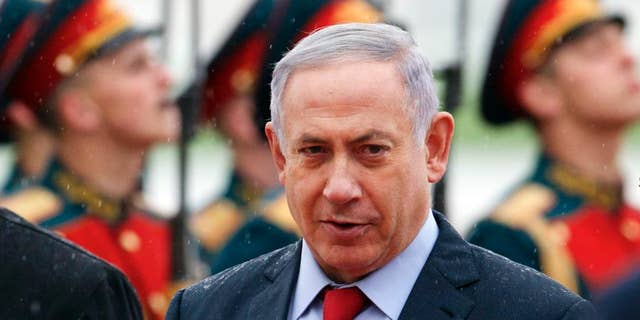 Israeli Prime Minister Benjamin Netanyahu reviews an honour guards shortly upon his arrival to government Vnukovo II airport just outside Moscow, Russia, on Monday, June 6, 2016. Netanyahu is on official visit to Russia. (AP Photo/Ivan Sekretarev)