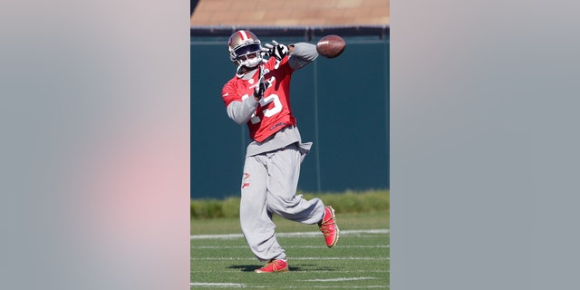 San Francisco 49ers wide receiver Michael Crabtree (15) practices at an NFL football training facility in Santa Clara, Calif., Friday, Jan. 25, 2013. The 49ers are scheduled to play the Baltimore Ravens in the Super Bowl on Sunday, Feb. 3. (AP Photo/Jeff Chiu)