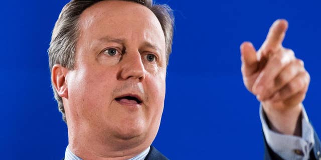 FILE-In this Tuesday, June 28, 2016 file image, British Prime Minister David Cameron addresses the media during an EU summit in Brussels. A key British parliamentary committee has said on Wednesday Sept 14 2016 that former Prime Minister David Cameron's military intervention in Libya was misguided and helped spur the rise of Islamic extremism there. (AP Photo/Geert Vanden Wijngaert file)