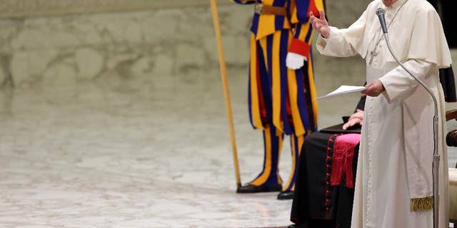Pope Francis delives his speech during an audience with members of the "Policoro Group" a catholic association created by Italian Episcopal Conference to promote youth employment, at the Vatican, Monday, Dec. 14, 2015. (AP Photo/Gregorio Borgia)